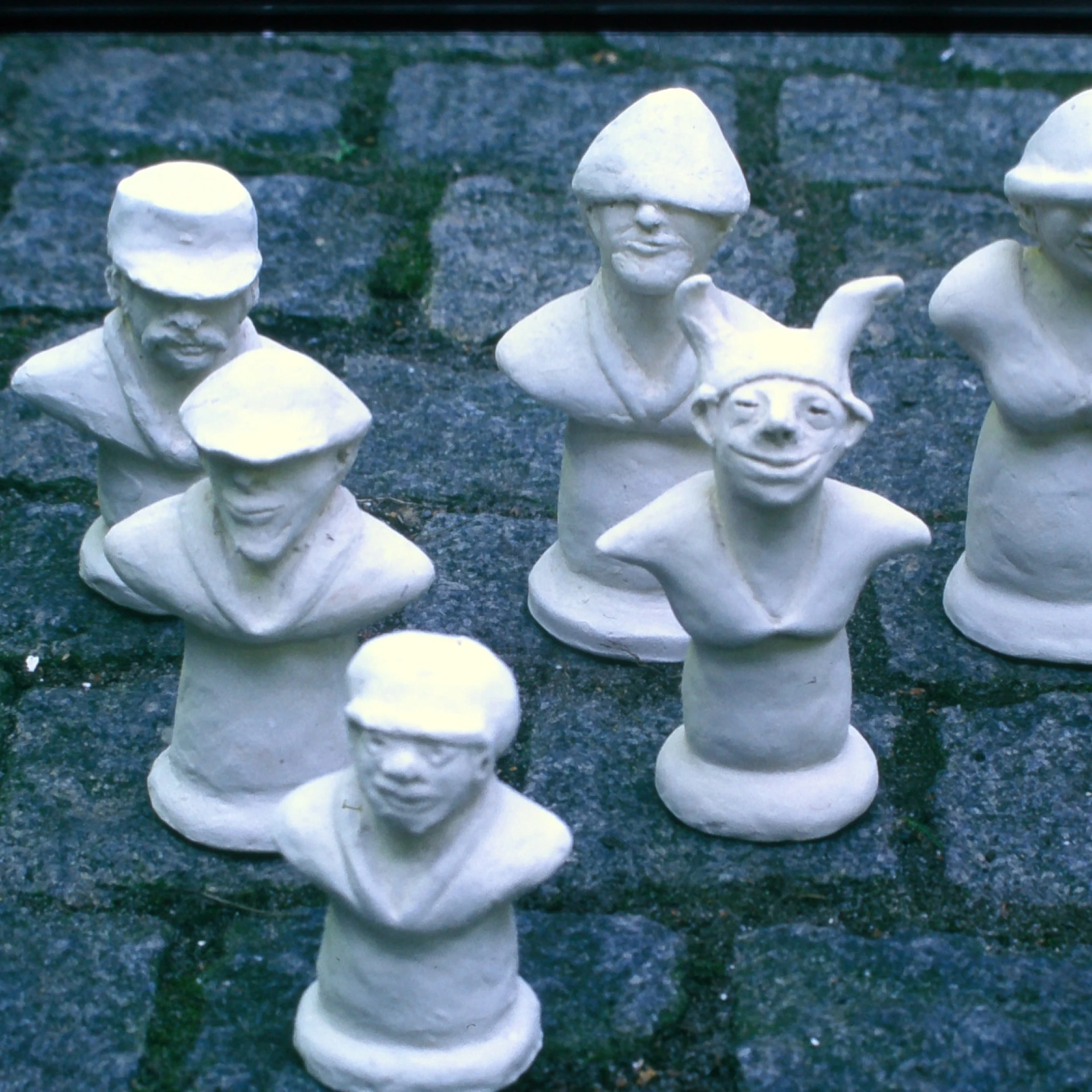 *Schachfiguren*, 1997, 14 x 7 x 6 cm each, burnt clay
