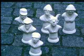 *Schachfiguren*, 1997, 14 x 7 x 6 cm each, burnt clay