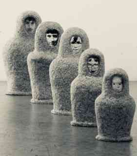 *Matrioschkas*, 1998, height 60 - 170 cm, papier-mâché, wire, photocopies