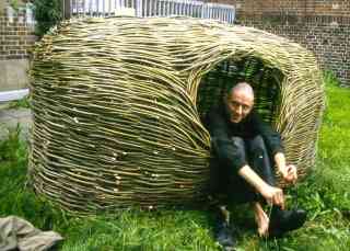 *Schlafkorb*, 2000, 240 x 124 x 140 cm, willow rods, flocati, mattress