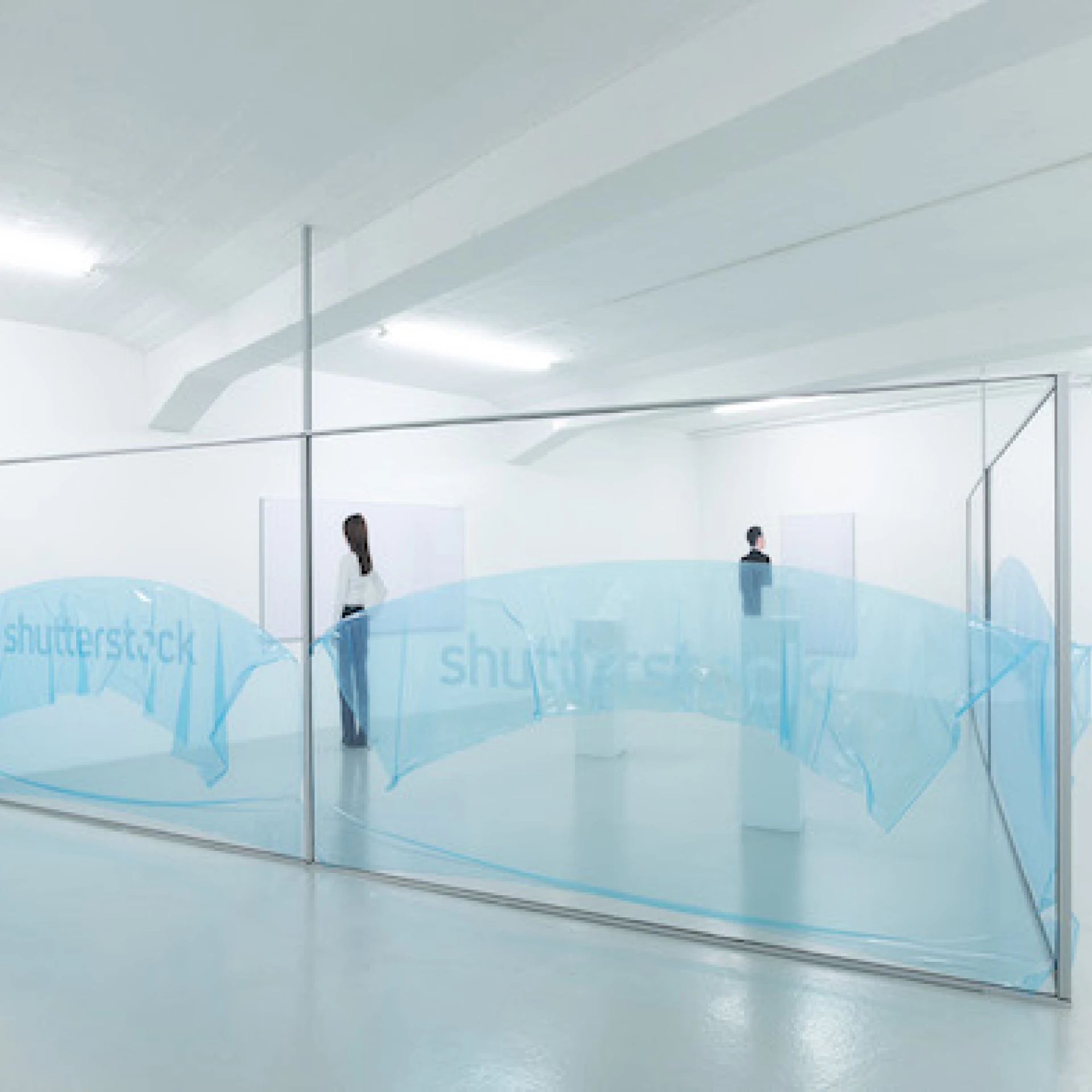 un_content, 2019
Wand mit Schriftzug in etched-glass-Optik, Acrylglas farblos XT 2 mm, 12 x 2 Meter
Messebau Textilspannrahmen, 16:9, 23 mm(Dekotex Messestoff / Druck uni weiß, unbedruckt, 210 gr./qm, matte Oberfäche, sehr kraftvolles Druckergebnis, B1 zertifziert)115 x 200 cm / 155 x 88 cm
3 Sockel, Holz, weiß lackiert 30 x 30 x 100 cm / 30 x 30 x 112 cm / 26 x 26 x 121 cm